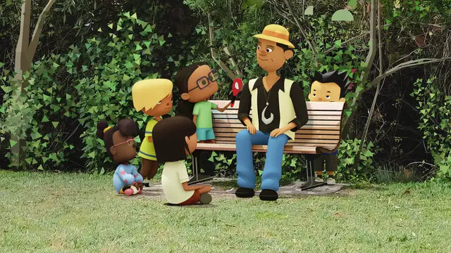 Desenho de baixo estímulo Netflix: um homem de chapeu, coletes amarelos, calça azul, camisa preta, rodeado por 5 crianças, sendo que uma delas usa óculo e está segurando um microfone.